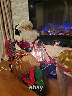 SANTA'S BEST Lighted Holiday Animation Figurine Christmas Santa Sleigh Reindeer