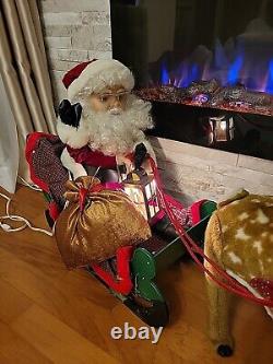 SANTA'S BEST Lighted Holiday Animation Figurine Christmas Santa Sleigh Reindeer