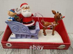 Santa Claus on Sled with Rudolph the red nose Reindeer Musical Lighted Figurine