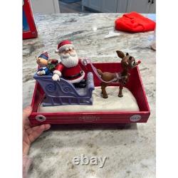 Santa Claus on Sled with Rudolph the red nose Reindeer Musical Lighted Figurine