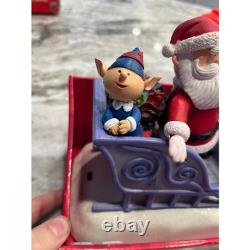 Santa Claus on Sled with Rudolph the red nose Reindeer Musical Lighted Figurine