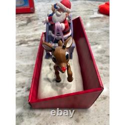 Santa Claus on Sled with Rudolph the red nose Reindeer Musical Lighted Figurine