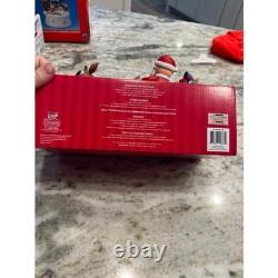 Santa Claus on Sled with Rudolph the red nose Reindeer Musical Lighted Figurine