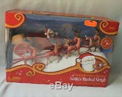 Santa Musical Sleigh Rudolph the Red Nosed Reindeer Display Stand Play Set 2009