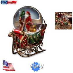 Santa with Reindeer and Sleigh Water Globe San Francisco Music Box Company