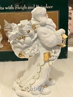 TRADITIONS White Porcelain Santa With Sleigh and Reindeer Gold colored Accents