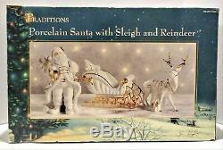 Traditions Large Porcelain Santa with Sleigh and Reindeer