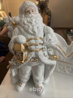 Traditions White Porcelain Santa With Sleigh and Reindeer With Gold Accents