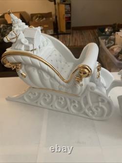 Traditions White Porcelain Santa With Sleigh and Reindeer With Gold Accents