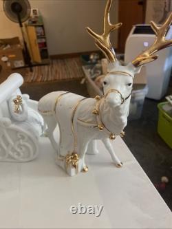 Traditions White Porcelain Santa With Sleigh and Reindeer With Gold Accents