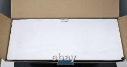 Traditions White Porcelain Santa With Sleigh and Reindeer With Gold Accents