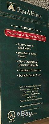 Trim A Home Animated Lighted And Musical Reindeer With Santa In Sleigh