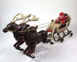 VTG Cast Iron Mechanical Enameled Fireplace Santa in Sleigh Reindeer Pull Toy