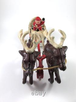 VTG Cast Iron Mechanical Enameled Fireplace Santa in Sleigh Reindeer Pull Toy