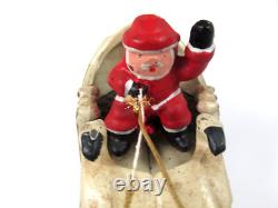 VTG Cast Iron Mechanical Enameled Fireplace Santa in Sleigh Reindeer Pull Toy