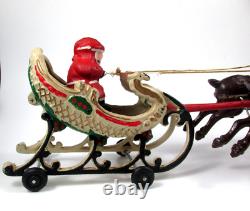 VTG Cast Iron Mechanical Enameled Fireplace Santa in Sleigh Reindeer Pull Toy