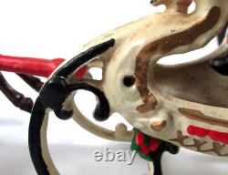 VTG Cast Iron Mechanical Enameled Fireplace Santa in Sleigh Reindeer Pull Toy
