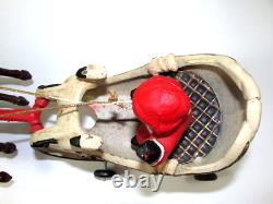 VTG Cast Iron Mechanical Enameled Fireplace Santa in Sleigh Reindeer Pull Toy