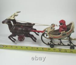 VTG Cast Iron Mechanical Enameled Fireplace Santa in Sleigh Reindeer Pull Toy