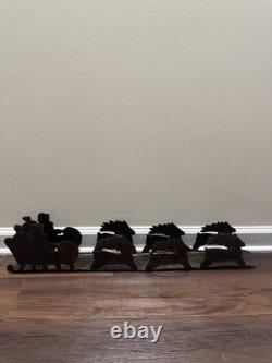 VTG Rustic Large Hand cut Dark Metal Santa Sleigh w Reindeer Candle Holder
