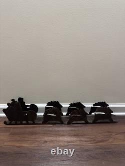 VTG Rustic Large Hand cut Dark Metal Santa Sleigh w Reindeer Candle Holder