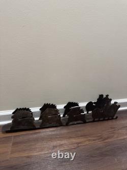 VTG Rustic Large Hand cut Dark Metal Santa Sleigh w Reindeer Candle Holder