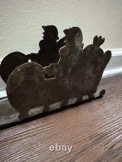 VTG Rustic Large Hand cut Dark Metal Santa Sleigh w Reindeer Candle Holder