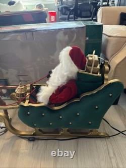 Vintage 1998 Animated Reindeer and Santa in Sleigh in Original Box Trim A Home