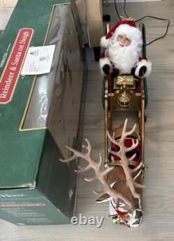 Vintage 1998 Animated Reindeer and Santa in Sleigh in Original Box Trim A Home