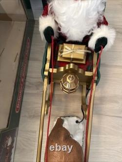 Vintage 1998 Animated Reindeer and Santa in Sleigh in Original Box Trim A Home