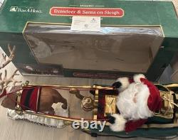 Vintage 1998 Animated Reindeer and Santa in Sleigh in Original Box Trim A Home