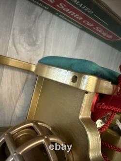 Vintage 1998 Animated Reindeer and Santa in Sleigh in Original Box Trim A Home