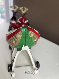 Vintage Cast Iron Santa In Sleigh with Reindeer on Wheels Heavy/Excellent