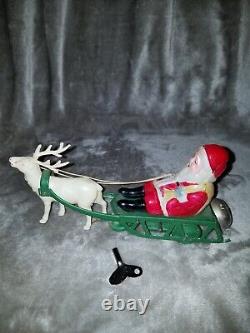 Vintage Celluloid Santa & Reindeer WithMetal Sleigh Wind Up Toy