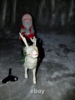 Vintage Celluloid Santa & Reindeer WithMetal Sleigh Wind Up Toy