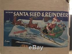 Vintage Empire Blow Mold Santa with sleigh and two reindeer Brand New never used