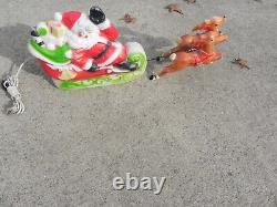 Vintage Empire Santa Sleigh, and Reindeer Blow Molds