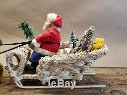Vintage FAO Schwartz Santa with Reindeer and Wicker Sleigh with Toys