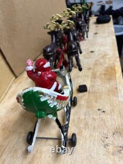 Vintage Hubley (unverified) Cast Iron Santa Sleigh with 8 reindeer