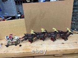 Vintage Hubley (unverified) Cast Iron Santa Sleigh with 8 reindeer