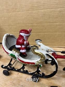 Vintage Hubley (unverified) Cast Iron Santa Sleigh with 8 reindeer