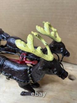 Vintage Hubley (unverified) Cast Iron Santa Sleigh with 8 reindeer