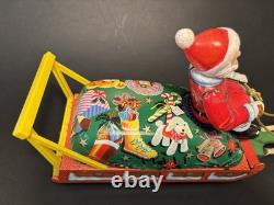 Vintage Japan Tin Santa Claus Reindeer Sleigh Toy