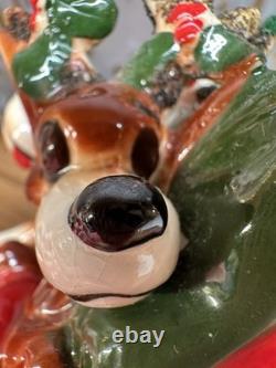 Vintage Kreiss Santa Pulling Sleigh With Sleepy Reindeer 7 1/2 Long 4 1/2 Tall