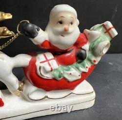 Vintage MidCentury Relco Labeled Santa Sleigh Chained Reindeer Candleholder