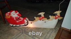 Vintage Santa Sleigh Reindeer Blow Mold