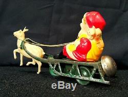 Vintage Tin Windup Celluloid Santa Claus With Sleigh Reindeer Bell Toy Christmas