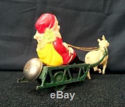 Vintage Tin Windup Celluloid Santa Claus With Sleigh Reindeer Bell Toy Christmas