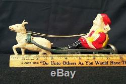 Vintage Tin Windup Celluloid Santa Claus With Sleigh Reindeer Bell Toy Christmas