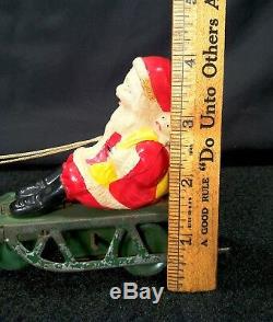 Vintage Tin Windup Celluloid Santa Claus With Sleigh Reindeer Bell Toy Christmas